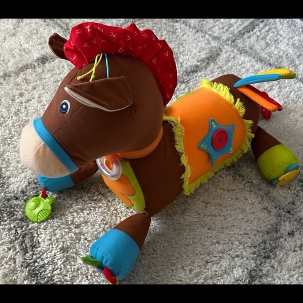 Orange and Brown Stuffed Horse with Vibrant Mane